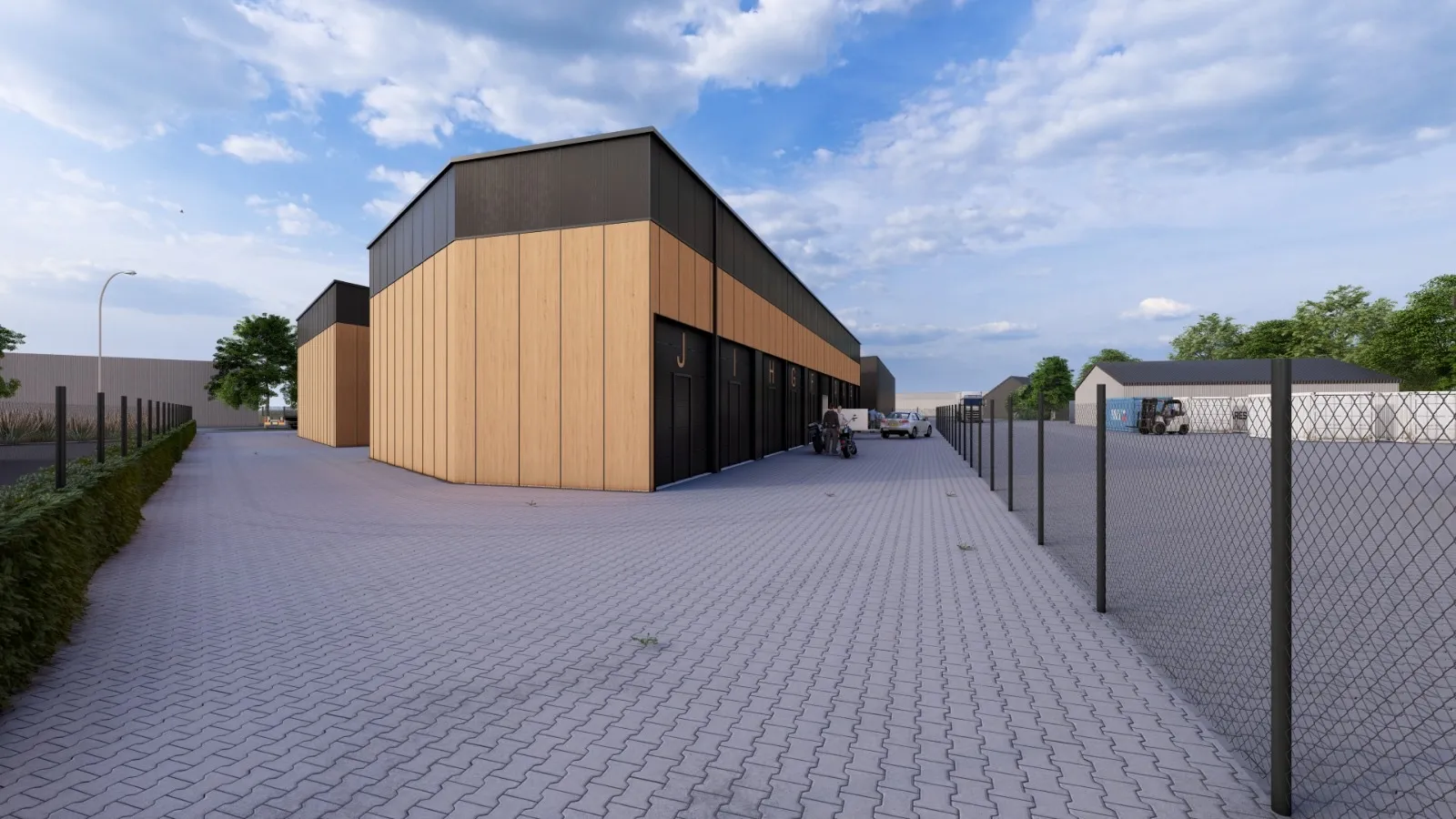 Zijaanzicht van District Leek met groenstrook en hekwerk
